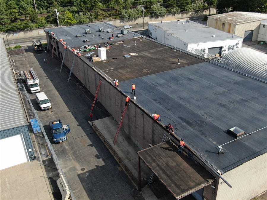 a group of workers on a roof